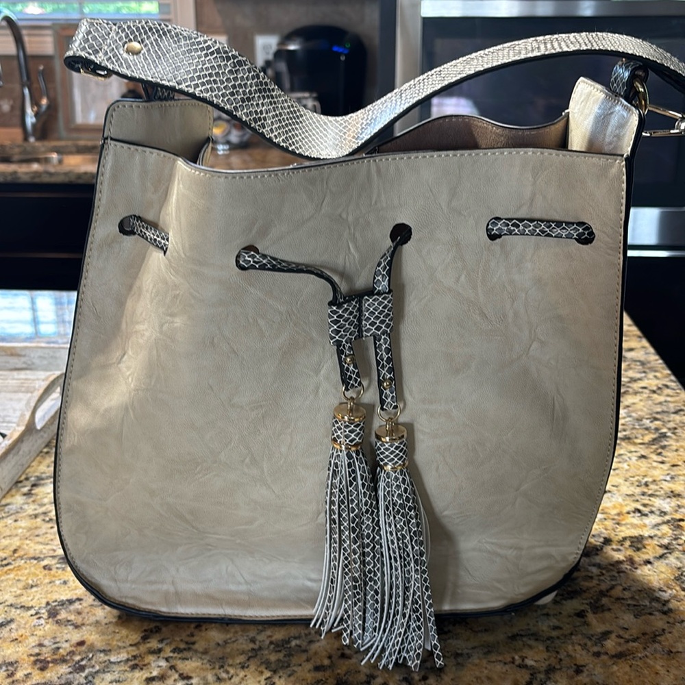 Frank Lyman purse. Gently used.  Came from frank lyman store in Las Vegas.